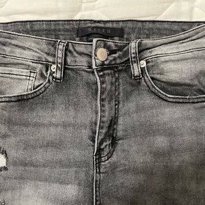 Black buckle jeans
